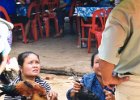 Thailand-Laos 2002 254  Livlig handel på markedet i Huai Xai Laos